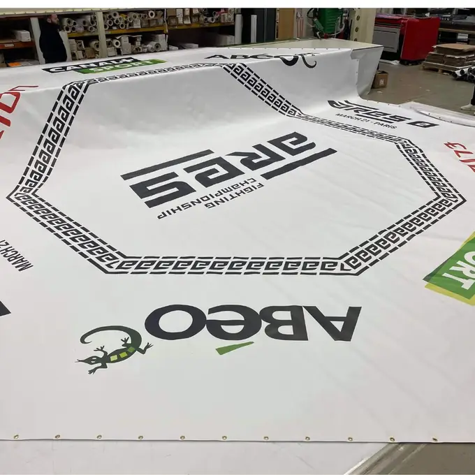 Custom printed circular gym mat with full event branding and team photo